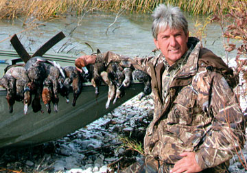 hunting1 wayne posing with hunted ducks